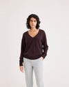 Front view of model wearing Winetasting Women's Regular Fit V-Neck Sweater.